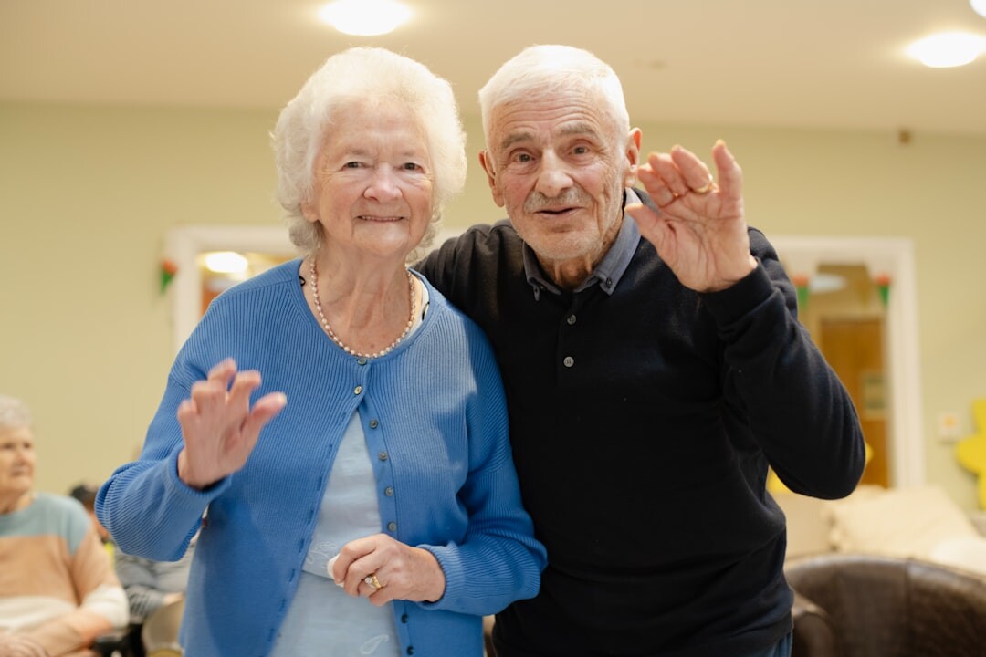 elderly couple smiling