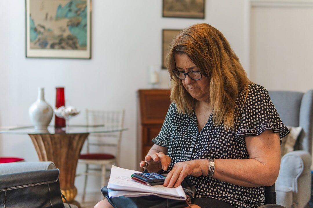 senior woman checking documents
