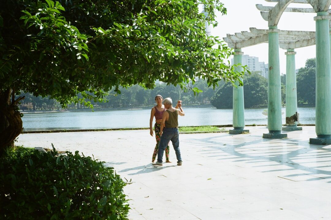senior couple walking in park